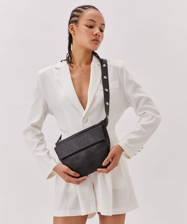 Neta Sade תיק פאוץ' מעור דגם עין שמר טקסטורה - תיק התיקיםנטע שדהנשים